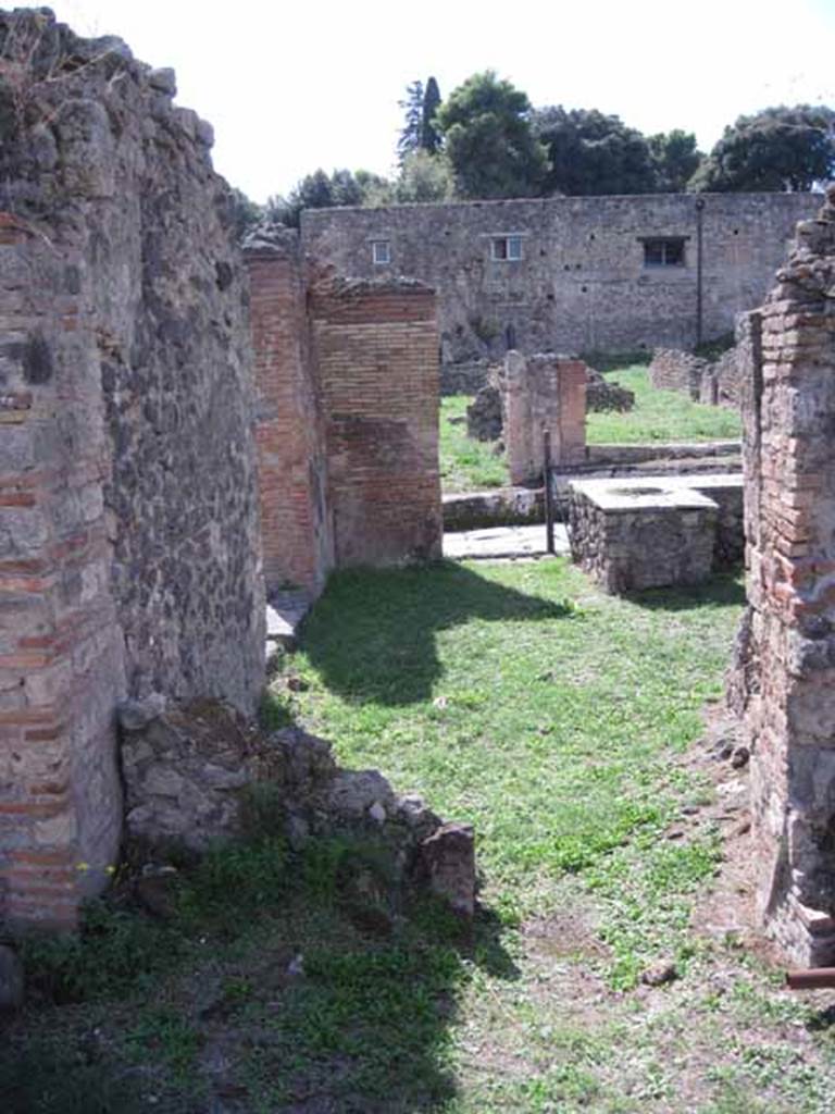 1.2.1 Pompeii. September 2010.  From rear of property, near I.2.31, looking west towards via stabiana. Photo courtesy of Drew Baker.
