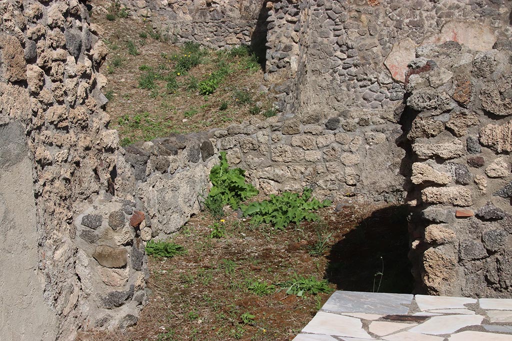I.2.11 Pompeii. October 2024. Looking east into small rear room of the bar. Photo courtesy of Klaus Heese.