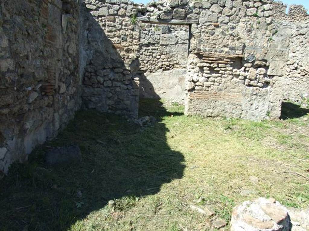 I.2.16 Pompeii.  March 2009. Doorway to Room 8 in North Portico
