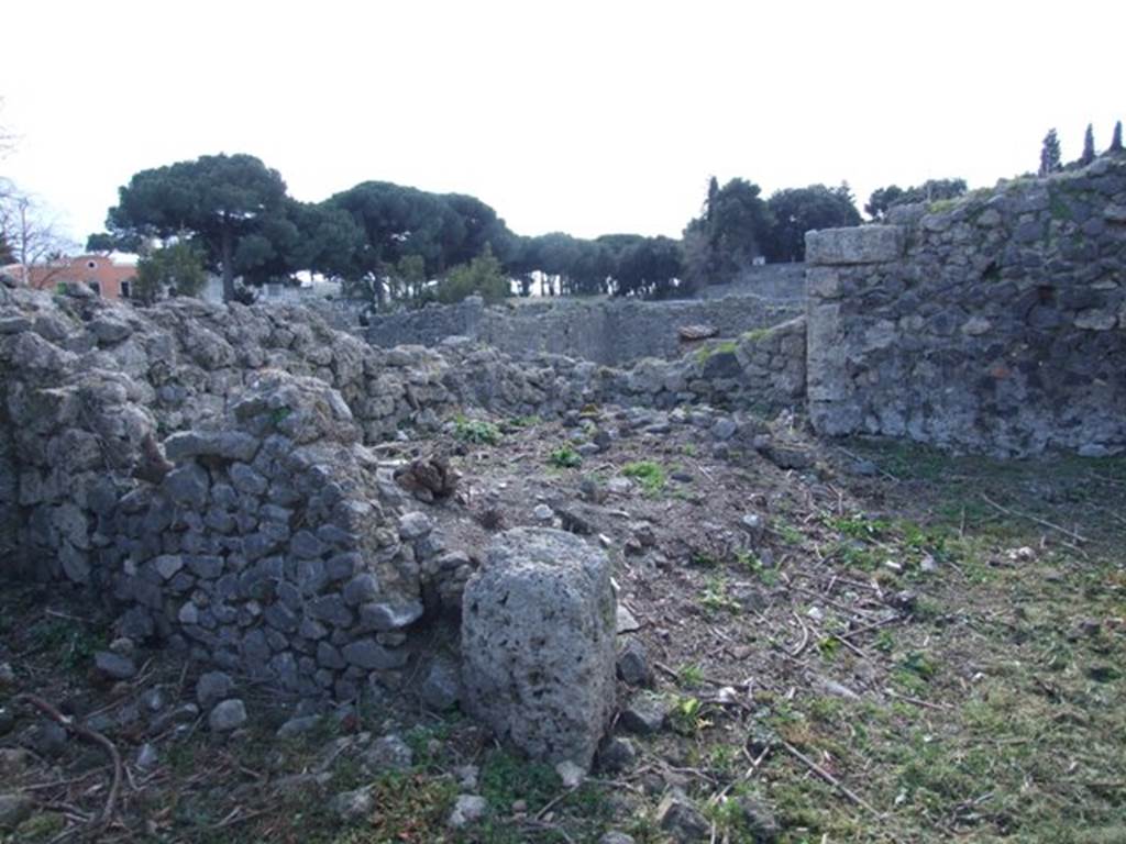 I.2.20 Pompeii.  March 2009. Site of staircase to upper floor, and two small rear rooms in south west corner of garden area.