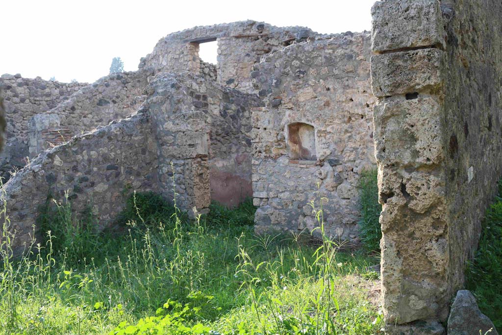I.2.22 Pompeii. September 2018. Looking towards north wall with doorway into room 4. Photo courtesy of Aude Durand.