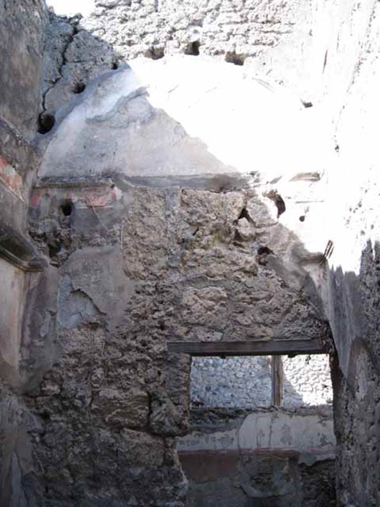 I.2.28 Pompeii. September 2010. North wall with doorway, of cubiculum in north-west corner of atrium Photo courtesy of Drew Baker.
