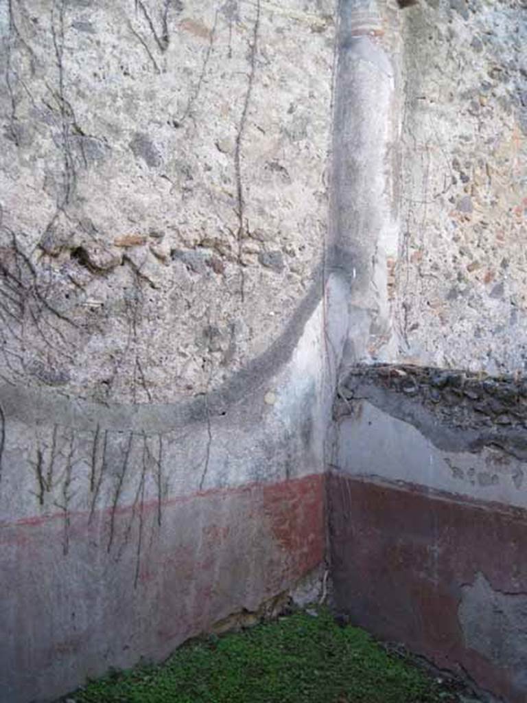 I.2.28 Pompeii. September 2010. North-west corner of room on south side of triclinium. Photo courtesy of Drew Baker.
