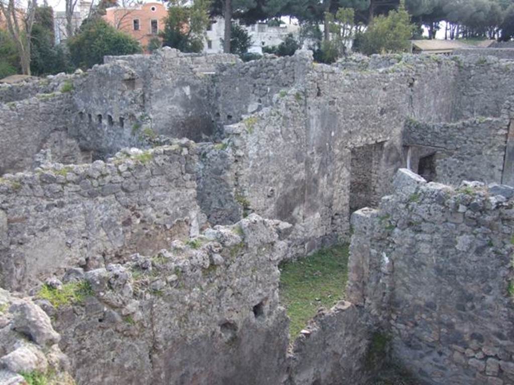 I.2.28 Pompeii.  March 2009.  Looking south west across rooms towards atrium.  Taken from I.2.20.