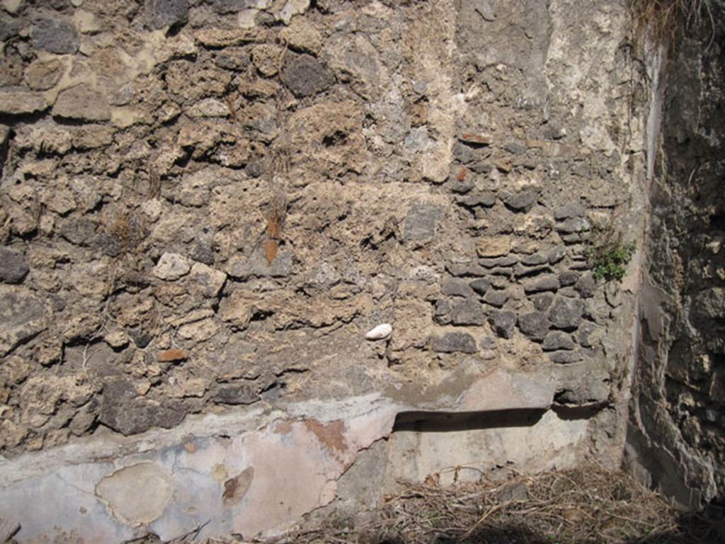 I.3.3 Pompeii. September 2010. North wall of second triclinium showing recess detail in north-east corner.  Photo courtesy of Drew Baker.
