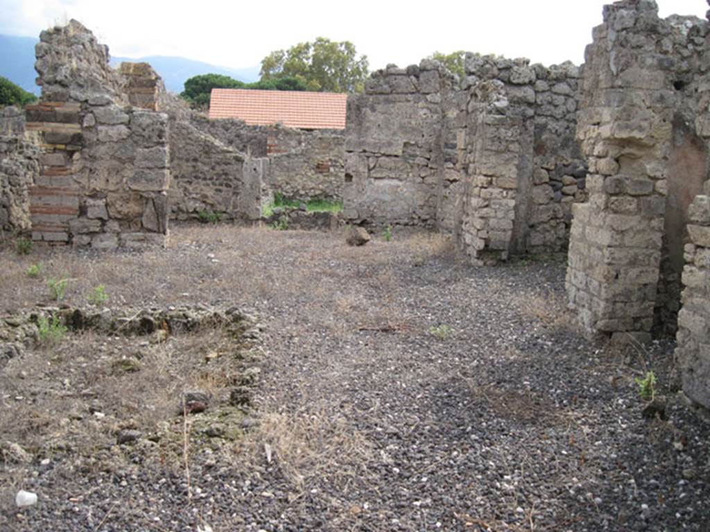 I.3.23 Pompeii. September 2010. Looking south across west side of atrium towards tablinum, from entrance doorway. Photo courtesy of Drew Baker.