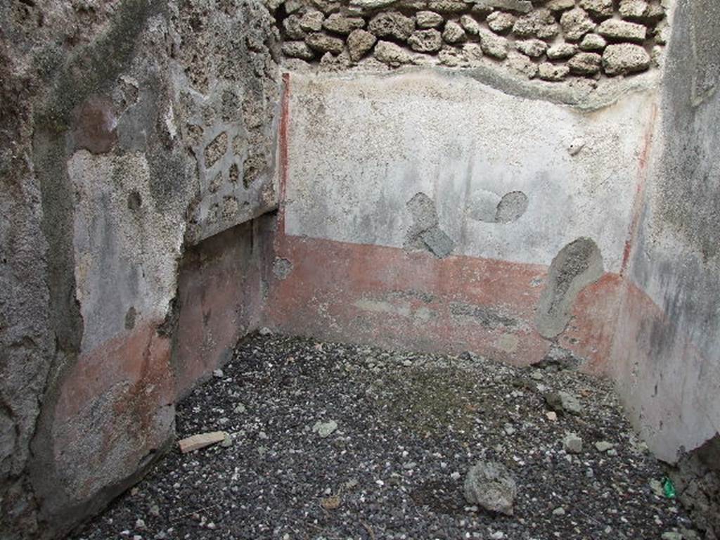 I.3.24 Pompeii. December 2006. Looking towards north wall of bedroom to west of entrance corridor. In the west wall, on the left, the recess for the bed can be seen. 
