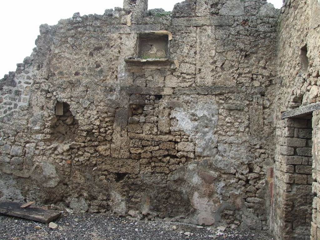 I.3.24 Pompeii. December 2006. Niche on west wall of atrium.
