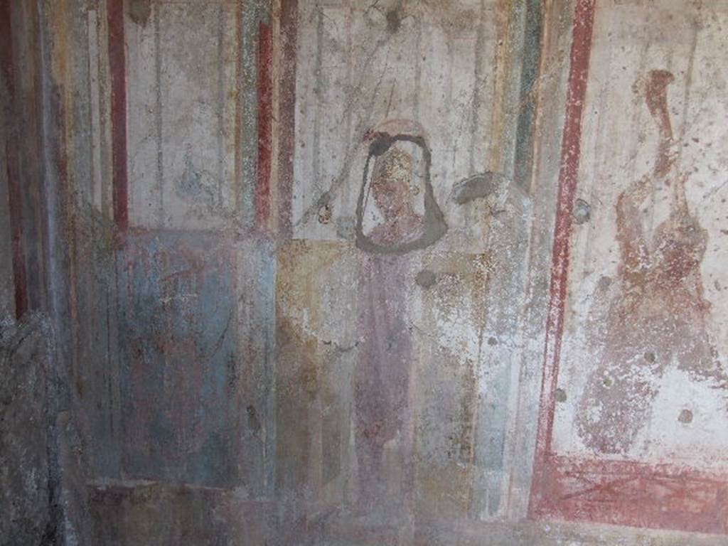 I.3.25 Pompeii. December 2006. South wall, with detail of wall painting of armed warrior with helmet, shield and lance. uty.