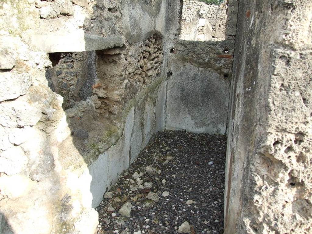 I.3.25 Pompeii. December 2006. Looking east into area of steps to upper floor, on north-east corner of peristyle.