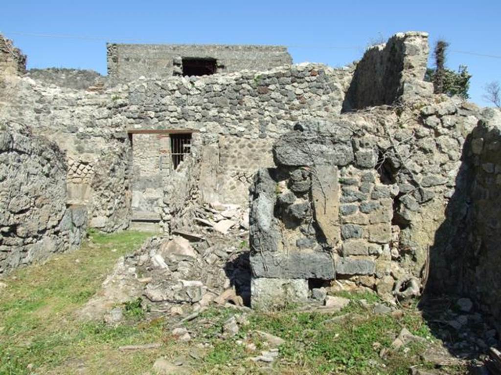 I.3.29 Pompeii. March 2009. Room 1, atrium, showing east wall and doorway to room 6, triclinium.