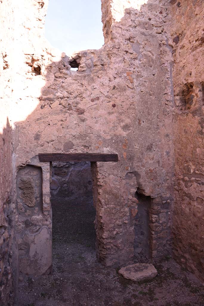 I.4.18 Pompeii. October 2019. Looking towards north wall of rear room, with doorway into workshop.
Foto Tobias Busen, ERC Grant 681269 DCOR.
