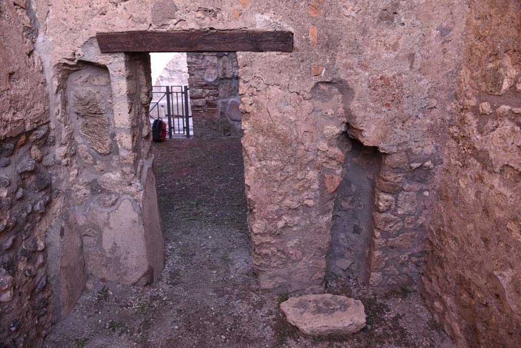 I.4.18 Pompeii. October 2019. North wall of rear room, looking through doorway into workshop.
Foto Tobias Busen, ERC Grant 681269 DCOR.

