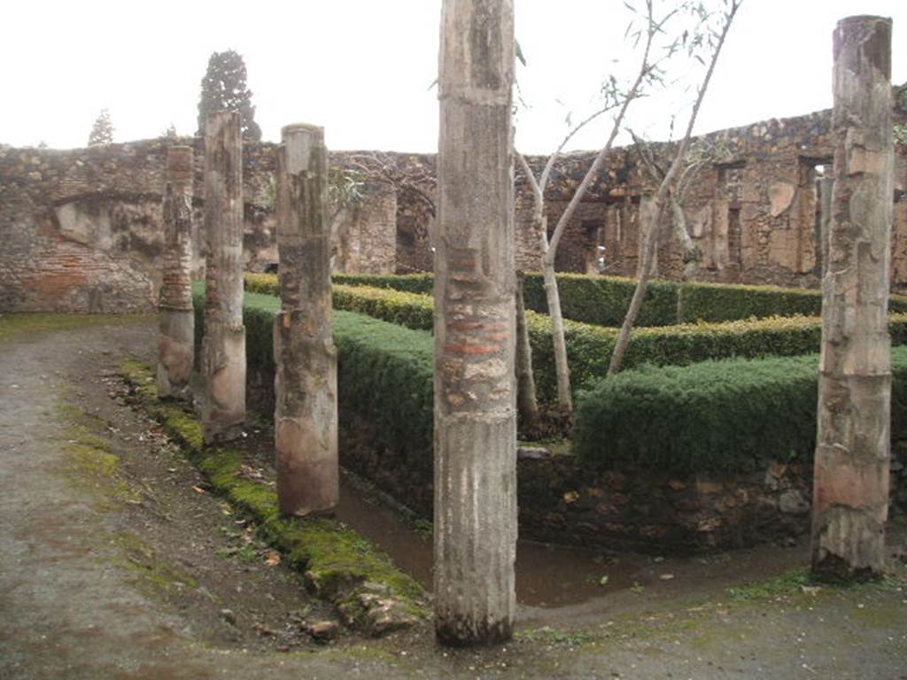 I.4.25 Pompeii. December 2007. Looking north-west across the lower peristyle 32, from outside room 35.