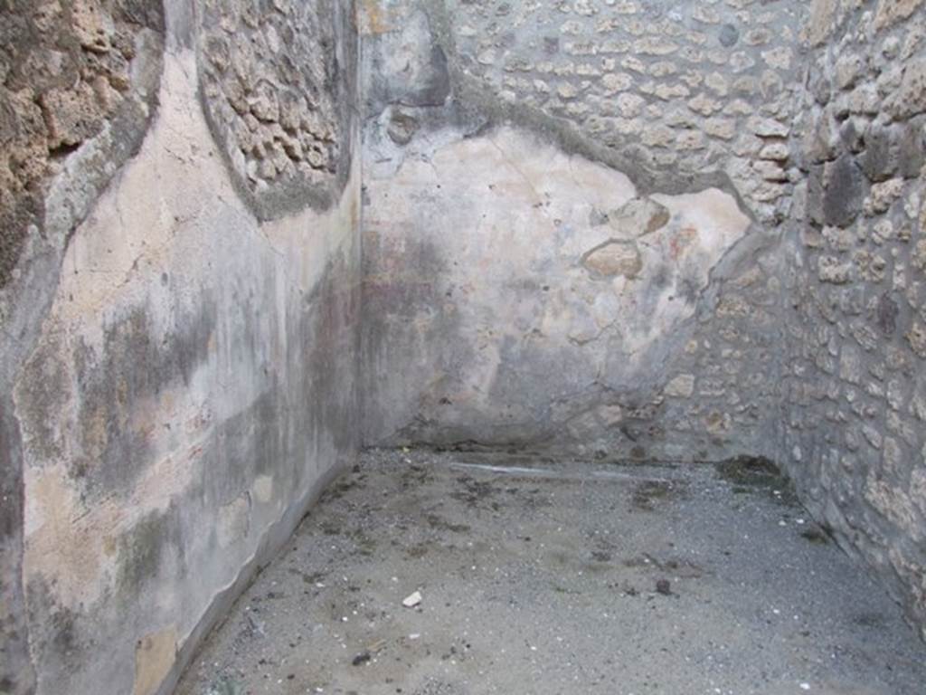 I.4.25 Pompeii. December 2007. Room 36, south-west corner, with remains of wall plaster.