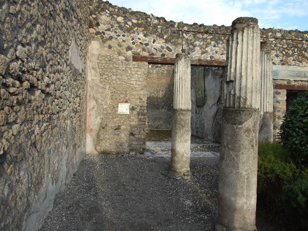 I.4.25 Pompeii. December 2006. Middle peristyle 17, looking east towards the doorway to triclinium of Antiope, room 19.