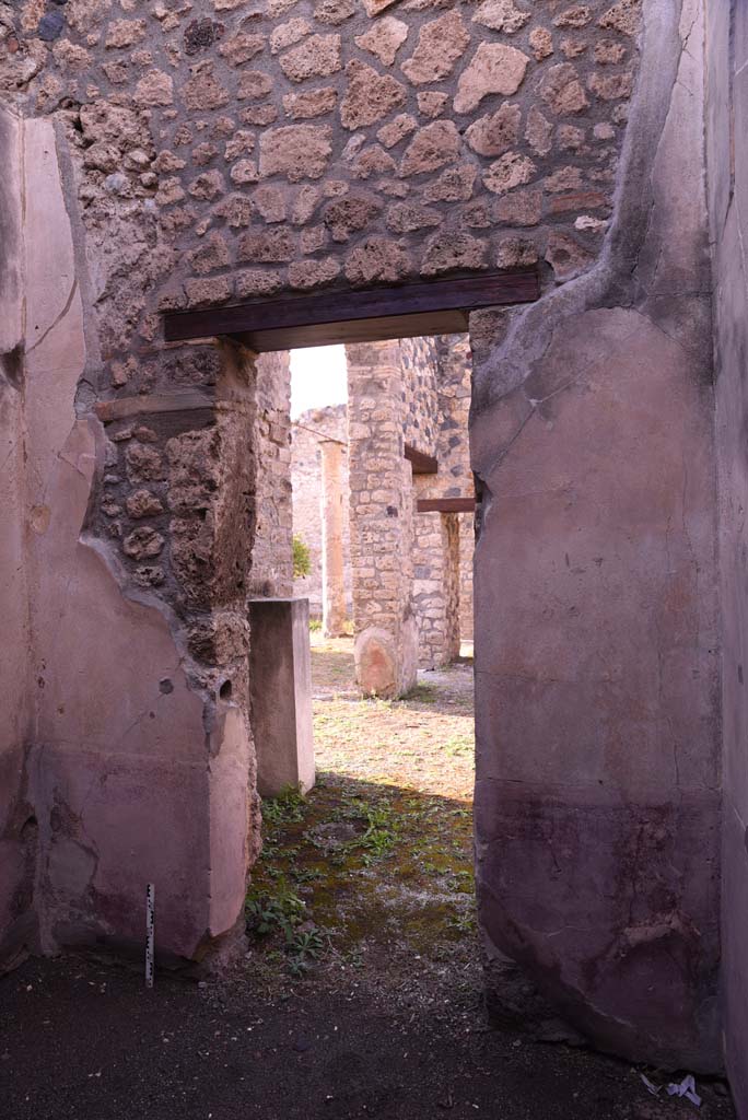 I.4.25 Pompeii. October 2019.
Unnumbered room next to room 30, (?room 66, cubiculum). Looking west towards doorway to room 21.
Foto Tobias Busen, ERC Grant 681269 DCOR.

