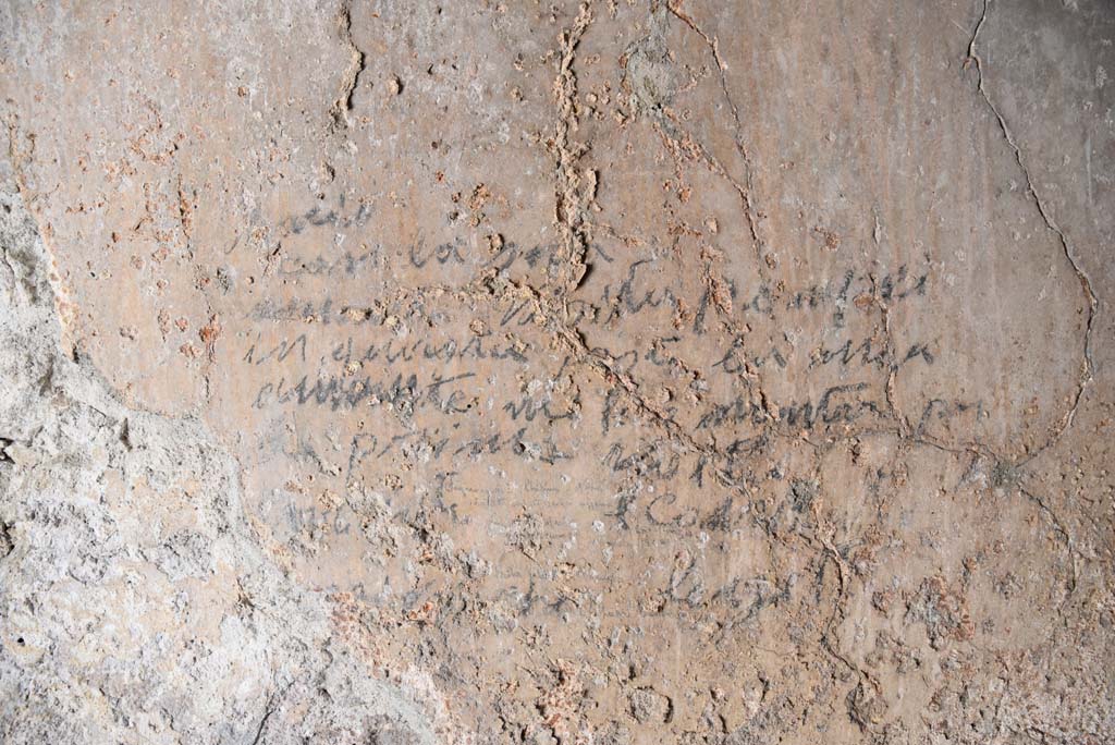 I.4.25/I.4.5 Pompeii. September 2020. Unnumbered corridor/room, detail of writing on east wall. 
Foto Tobias Busen, ERC Grant 681269 DCOR.


