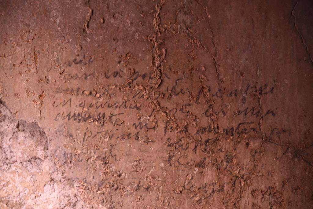I.4.25/I.4.5 Pompeii. October 2019. Unnumbered corridor/room, detail of writing from east wall. 
Foto Tobias Busen, ERC Grant 681269 DCOR.



