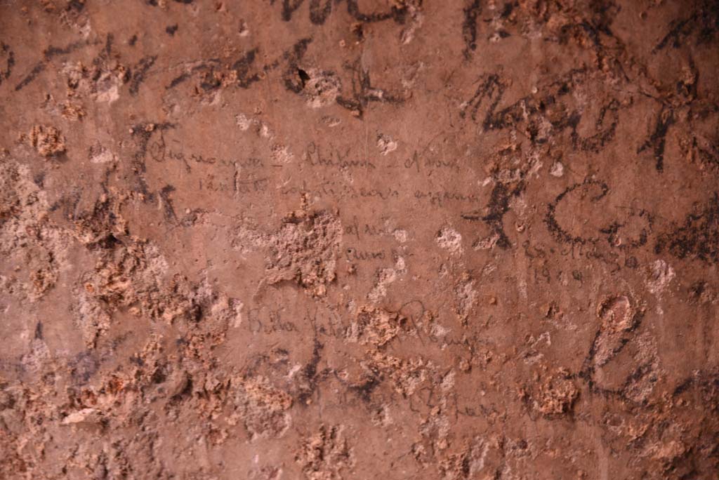 I.4.25/I.4.5 Pompeii. October 2019. Unnumbered corridor/room, detail of smaller writing from east wall. 
Foto Tobias Busen, ERC Grant 681269 DCOR.