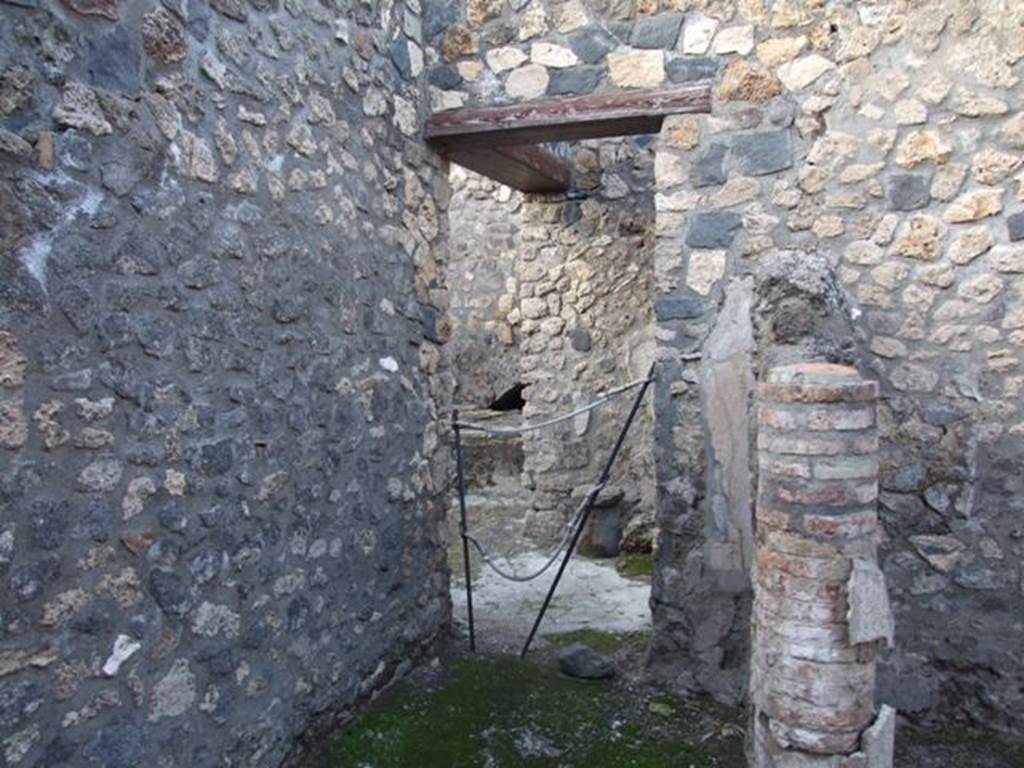 I.4.25 Pompeii. December 2007. Room 43, looking north in area with doorway leading to kitchen.
The west wall, on the left, is part of Corridor 13A. The room 43, on the right, was separated  by a small wall.
