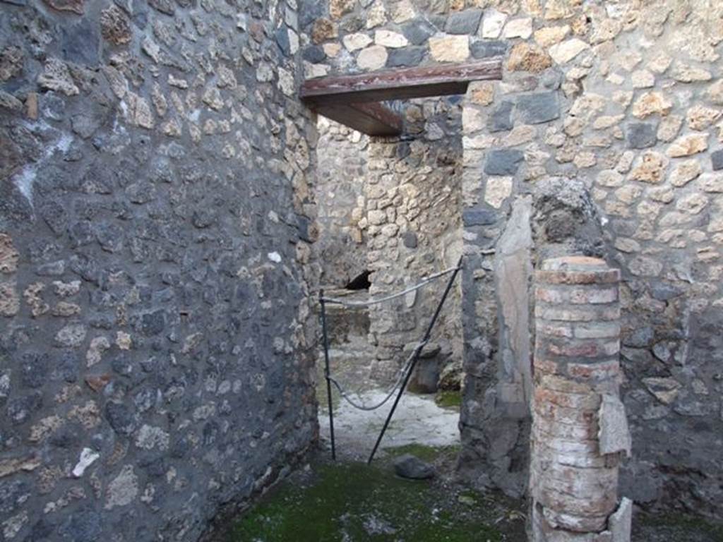I.4.25 Pompeii. December 2007. Room 43, looking north in area with doorway leading to kitchen.
The west wall, on the left, is part of Corridor 13A. The room 43, on the right, was separated  by a small wall.
