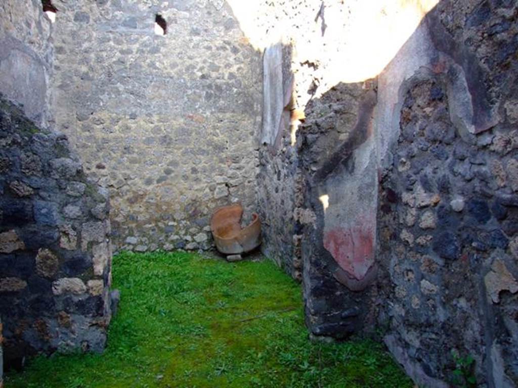 I.4.25 Pompeii. March 2009. 
Room 63 (at the rear) from room 61. On the right wall of room 63 is a doorway leading into the kitchen and latrine, room 64.

