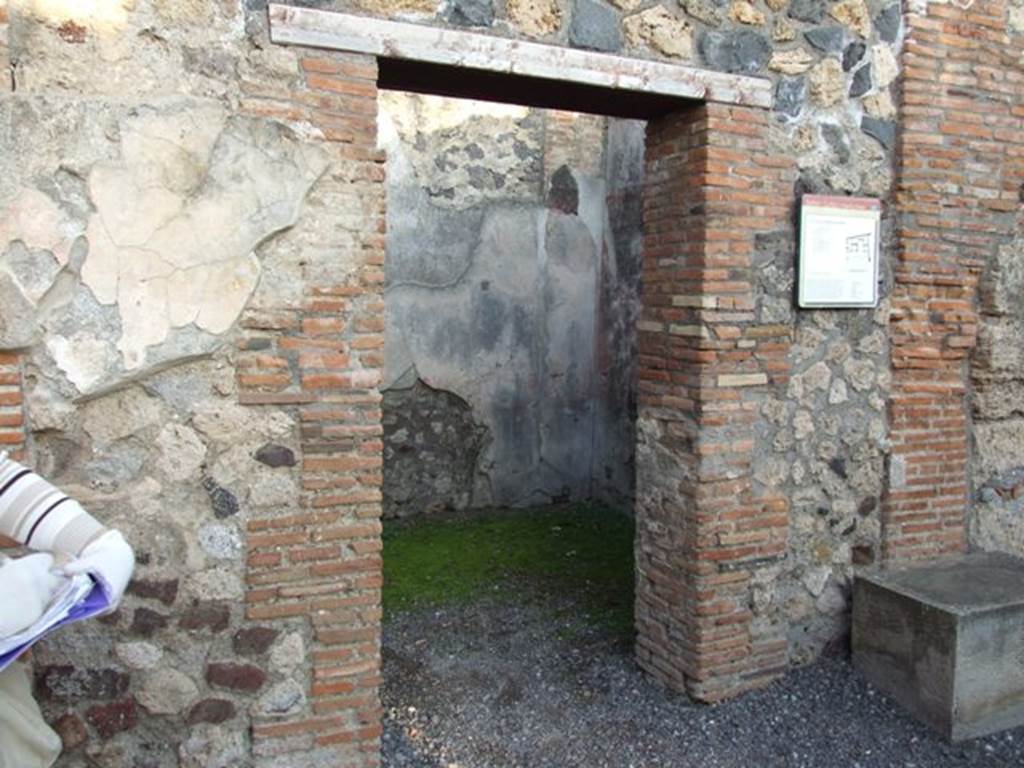 I.4.25 Pompeii. December 2007. Doorway to room 60, cubiculum on east side of upper peristyle.