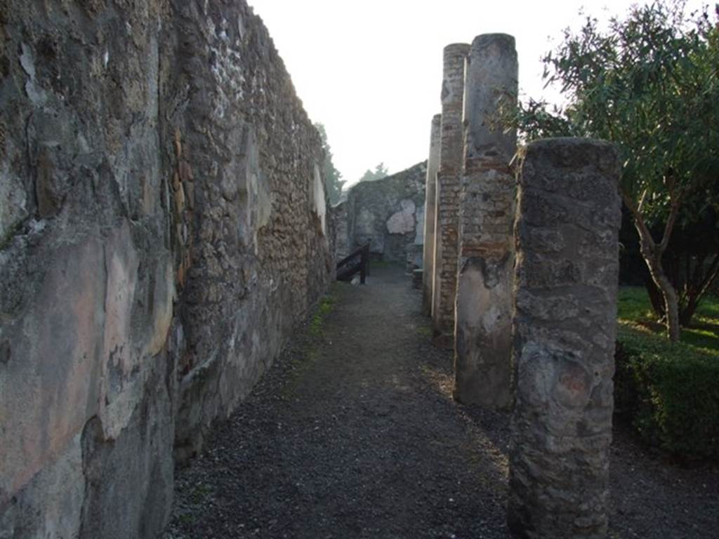 I.4.25 Pompeii. December 2007. Looking west along the south portico of the upper peristyle 56. 