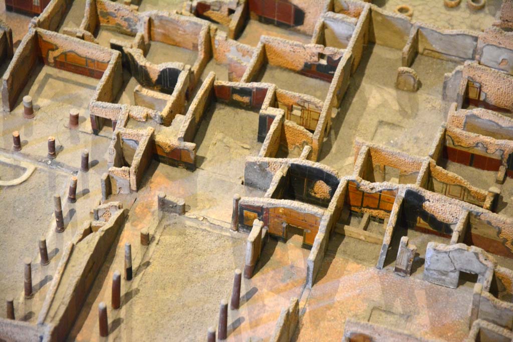 I.4.25 Pompeii. May 2019. Detail from model in Naples Archaeological Museum.
West end of Upper Peristyle 56, in centre, with room 57 above it.
Foto Tobias Busen, ERC Grant 681269 DCOR.
