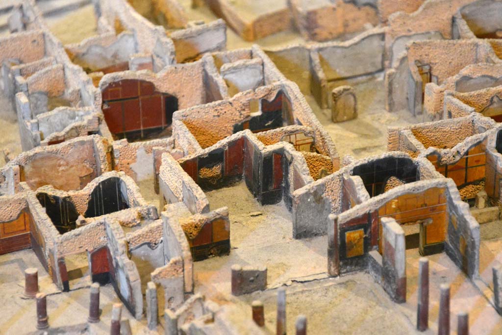 I.4.25 Pompeii. May 2019. Detail from model in Naples Archaeological Museum.
West end of Upper Peristyle 56, lower centre, with room 57, in centre with room 52, centre right.
Foto Tobias Busen, ERC Grant 681269 DCOR.
