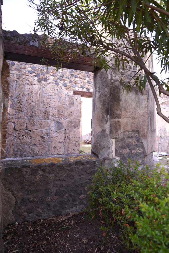 I.4.25 Pompeii. October 2019. 
Upper Peristyle 56, looking north towards pilaster on east end of window. 
Foto Tobias Busen, ERC Grant 681269 DCOR.

