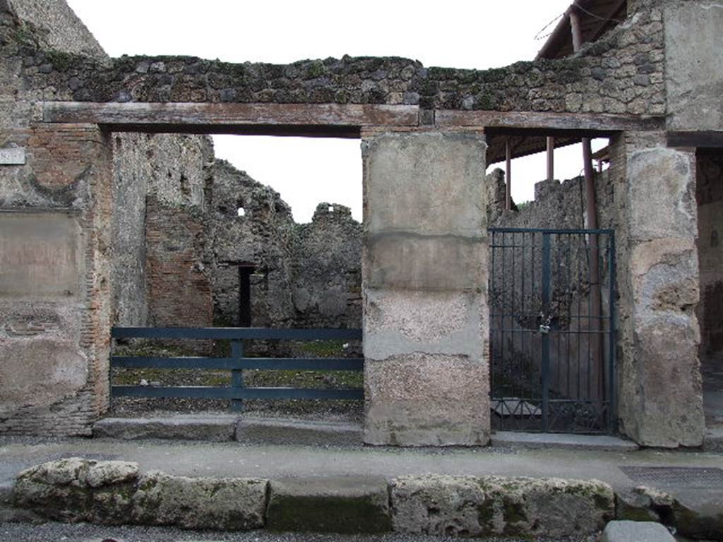 Painted graffiti  between I.6.1 and I.6.2 December 2006. See Della Corte, M., 1965.  Case ed Abitanti di Pompei. Napoli: Fausto Fiorentino. (p. 289)
According to Della Corte, the following electoral recommendation was found on the left of entrance number 2:
Carum II vir. v. a. s.  Vicini facite  CIL IV 7132. 
Today it is hardly readable.
