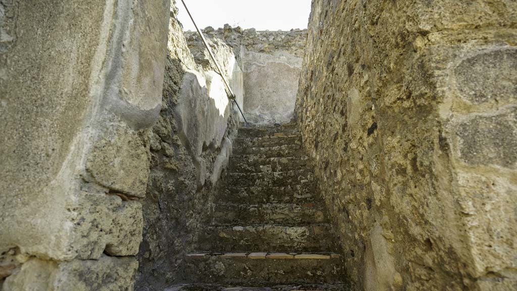 I.6.2 Pompeii. August 2021. Stairs to upper floor, on east side of atrium. Photo courtesy of Robert Hanson.