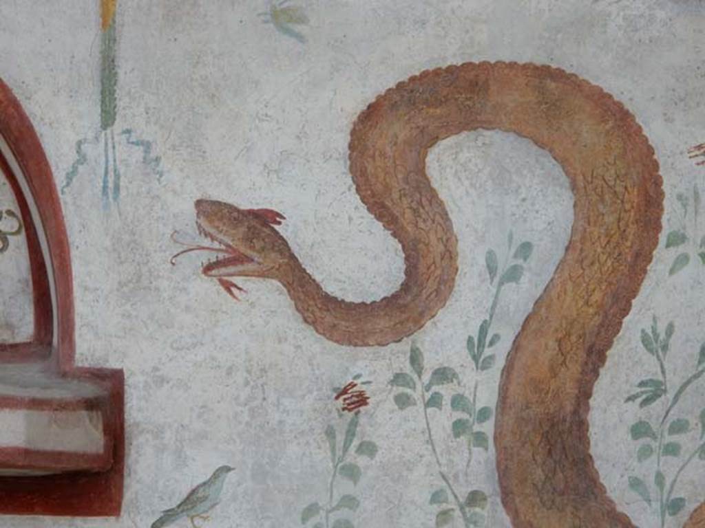 I.6.2 Pompeii. May 2017. Detail of painted serpent at north end of painted lararium. Photo courtesy of Buzz Ferebee. 
