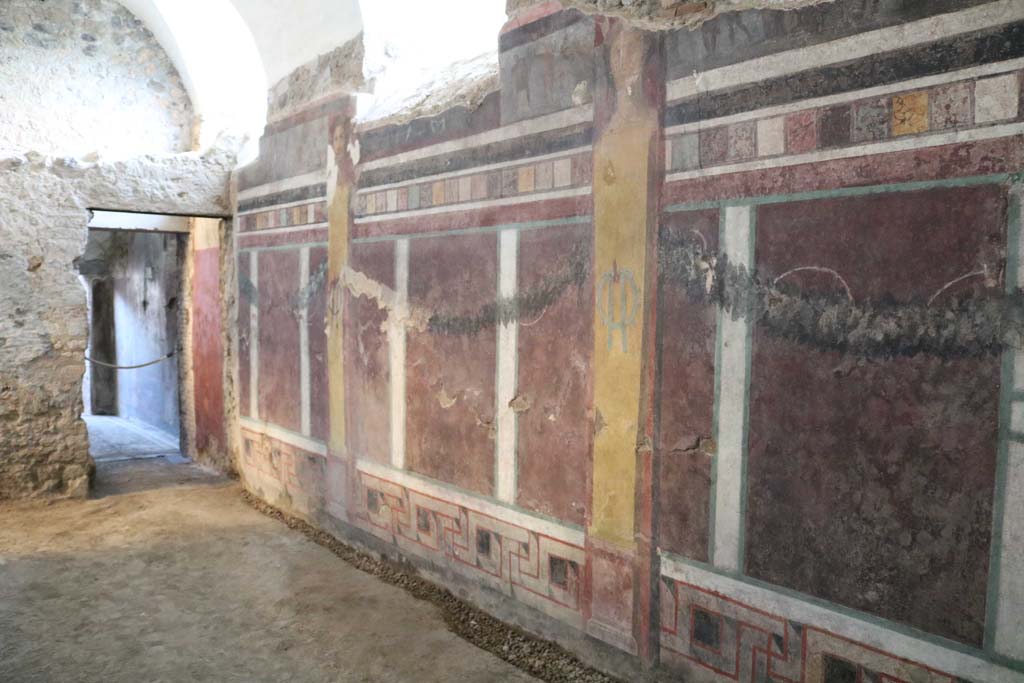 I.6.2 Pompeii. December 2018. 
Looking towards south end of west wall, near doorway to oecus/triclinium, on left. Photo courtesy of Aude Durand.
