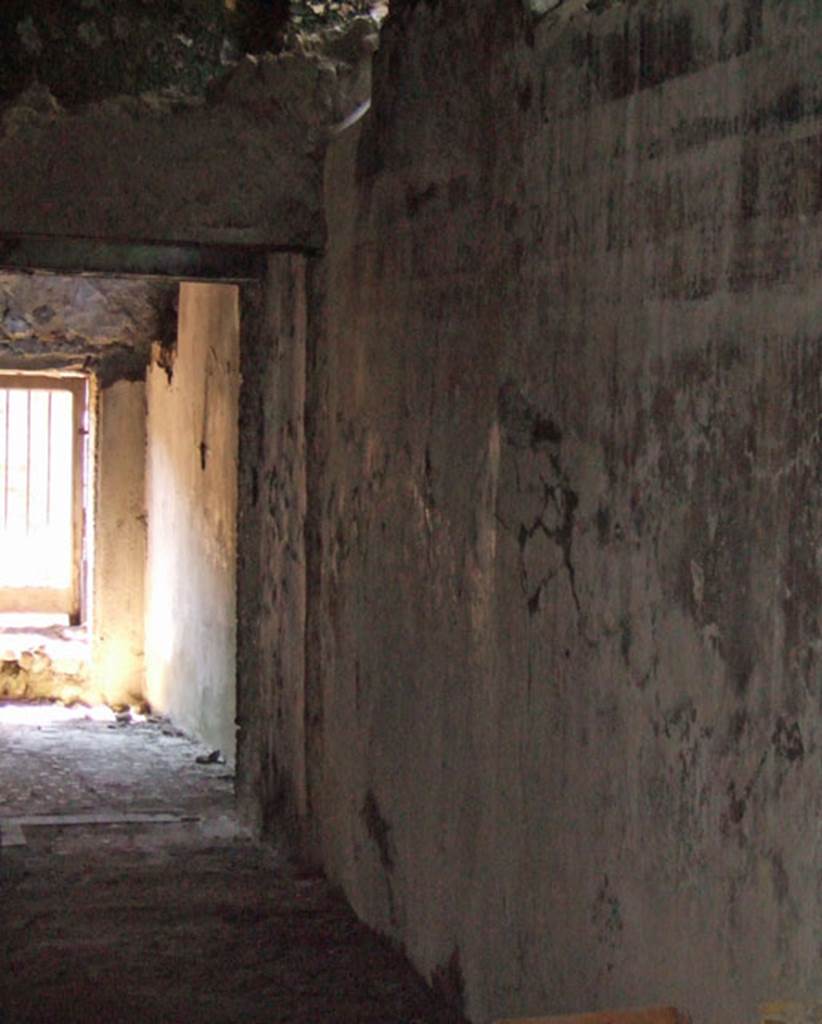 I.6.2 Pompeii. May 2006. Looking south along west wall of east wing of cryptoporticus. In the upper left can be seen the anteroom of the oecus/triclinium in the south-east corner. 
