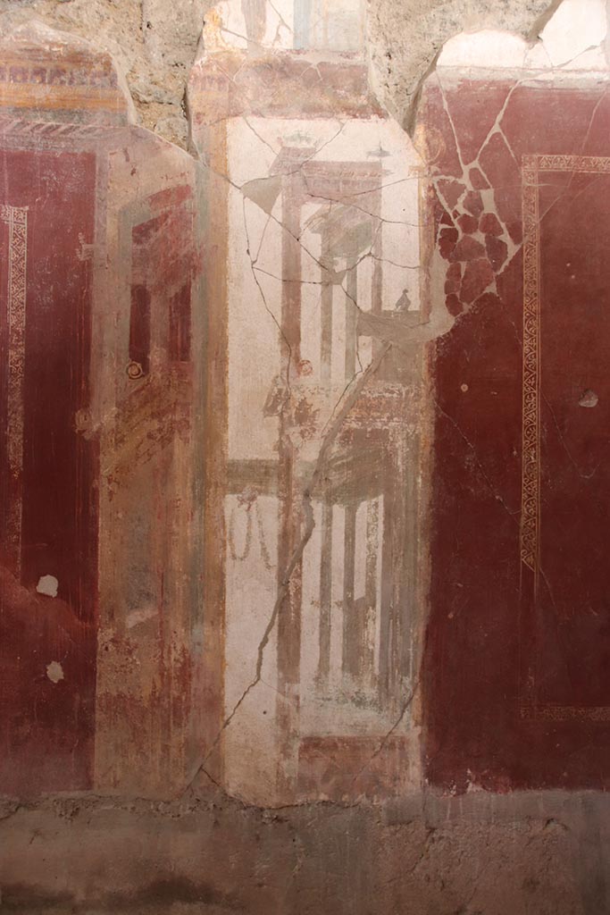 I.6.4 Pompeii. October 2024. 
Room 2, detail of painted decoration from north wall towards east end. Photo courtesy of Klaus Heese. 
