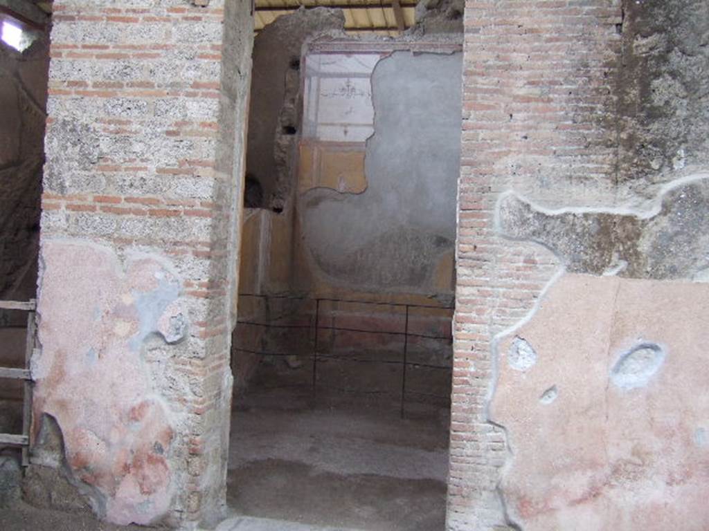 I.6.4 Pompeii.  December 2005.  Doorway to Room 4. 
