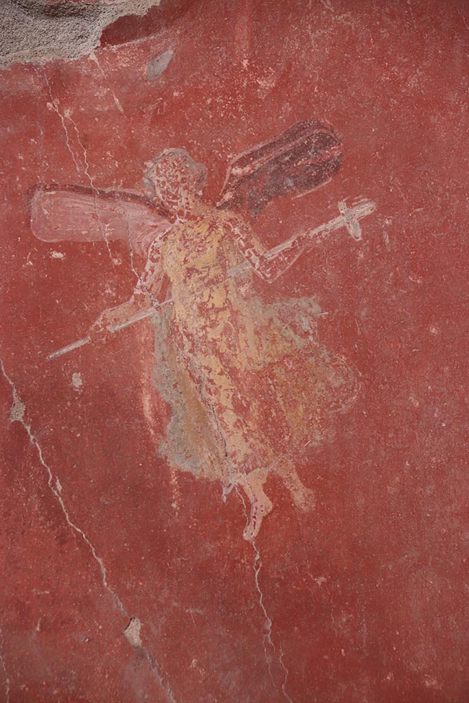 I.6.4 Pompeii. October 2024. 
Room 5, north-west corner. Painted flying figure on west wall. Photo courtesy of Klaus Heese.
