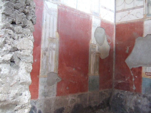 I.6.4 Pompeii.  March 2009.  Room 5, Detail of remains of painted figure on south wall, west end.