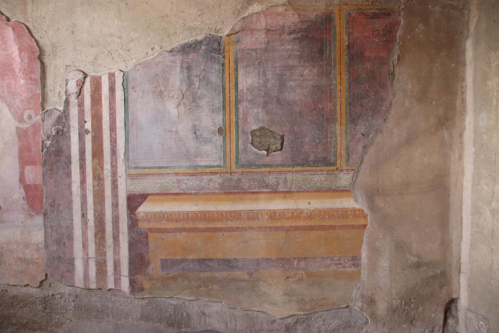 I.6.4 Pompeii. October 2024. Triclinium 11, east wall at south end. Photo courtesy of Klaus Heese. 