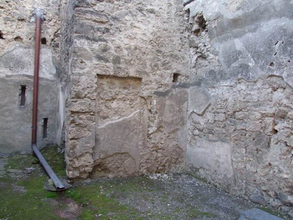 I.6.5 Pompeii. December 2007. South-west corner with blocked door.