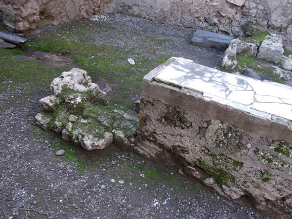 I.6.5 Pompeii.December 2007. Remains of south end of counter .