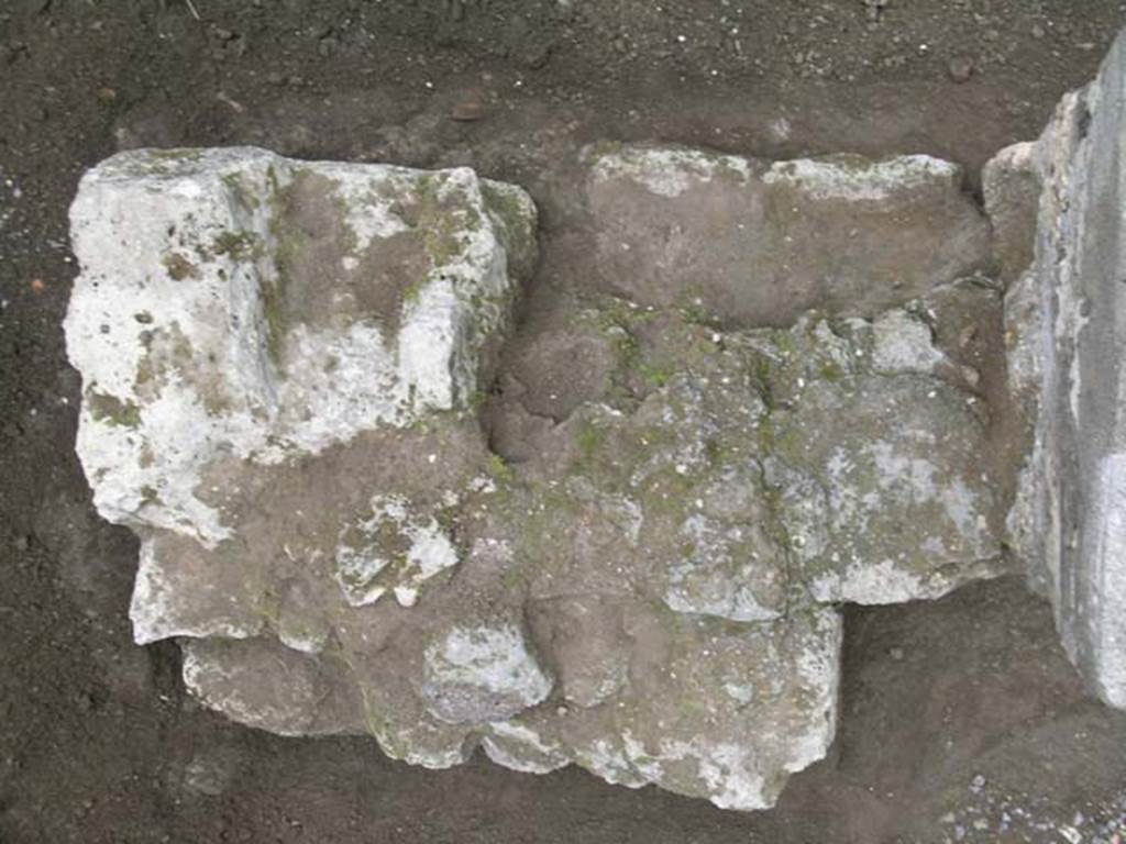 I.6.5 Pompeii. May 2004. Looking down on south end of counter, east side at lower edge. Photo courtesy of Nicolas Monteix.
