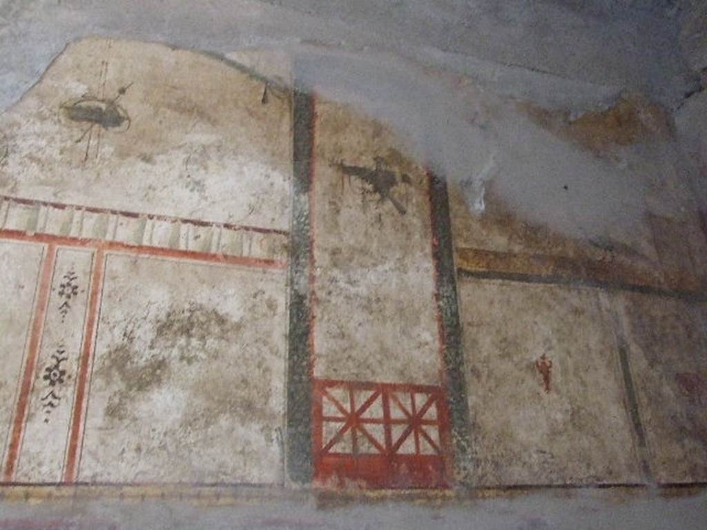 I.6.7 Pompeii. September 2019. Detail of frescoes from north end of west wall. Photo courtesy of Klaus Heese.