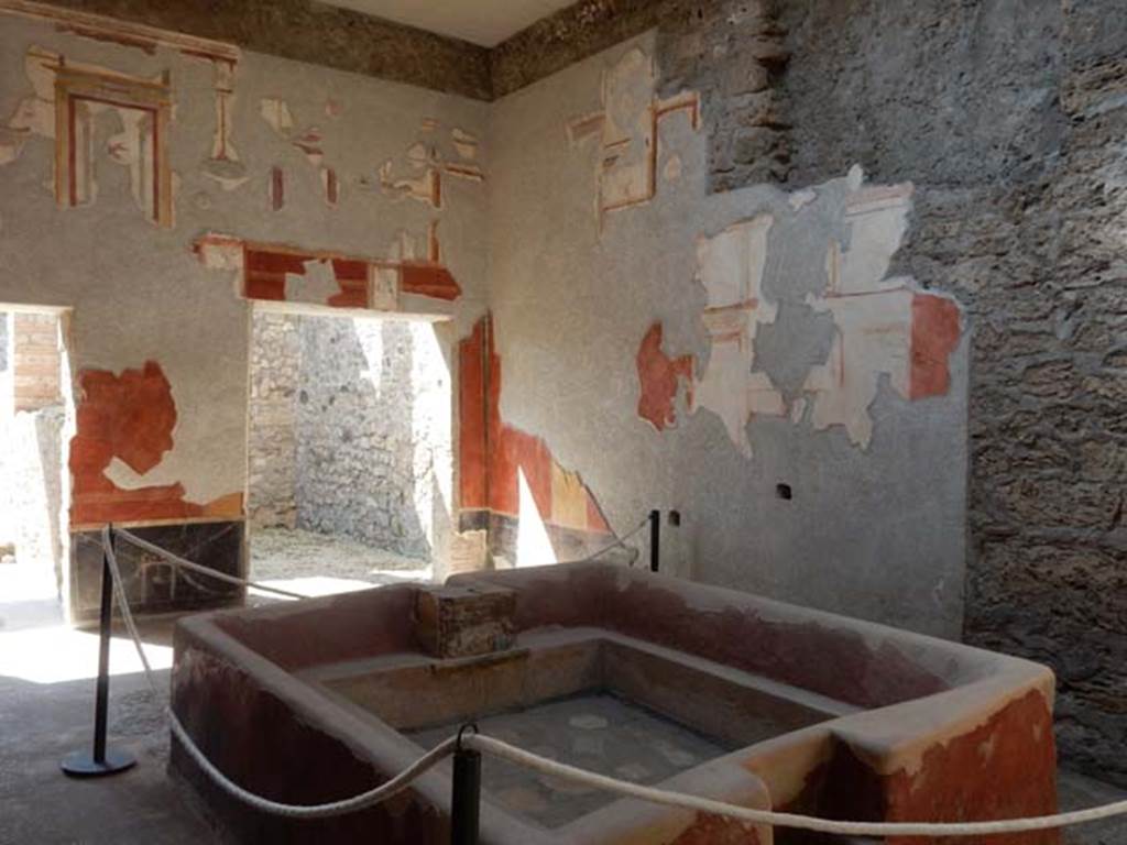 .6.7 Pompeii. May 2016. Looking across impluvium in atrium towards the south-west corner. The impluvium had been converted into a vat for fullery use. Photo courtesy of Buzz Ferebee.
