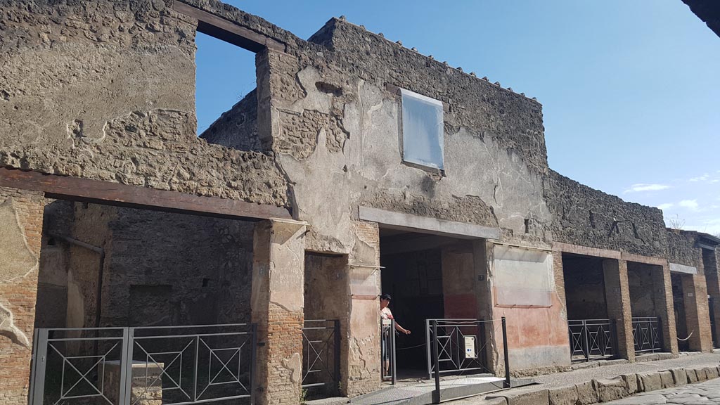 I.6.7 Pompeii, August 2023.
South side of Via dell’Abbondanza with entrance doorway in centre. Photo courtesy of Maribel Velasco.