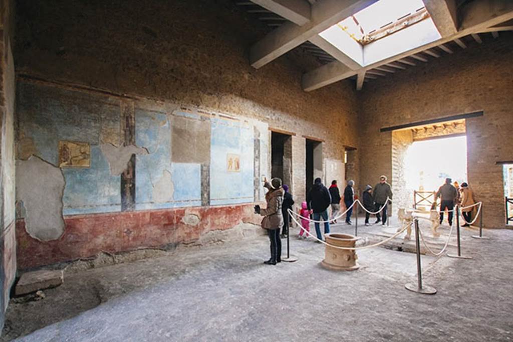 I.6.11 Pompeii. December 2014. Looking south across atrium and east wall, with doorways to two cubicula. Photo courtesy of Katharina Kuxhausen.