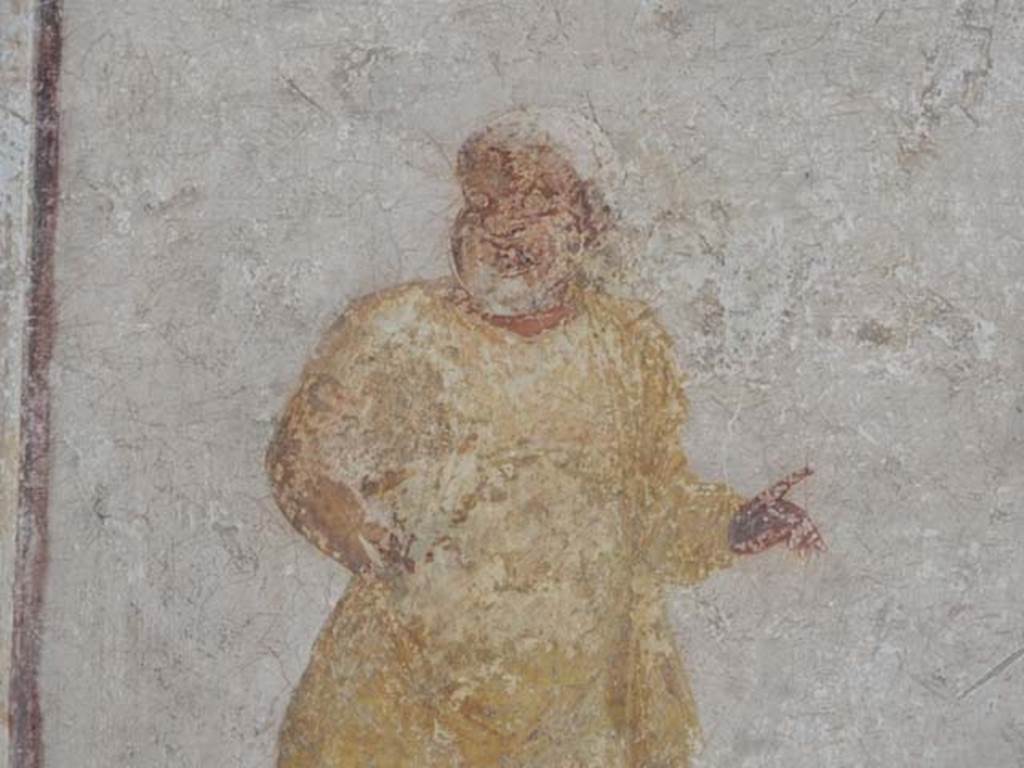 I.6.11 Pompeii. May 2012. East wall of atrium, detail from wall painting of theatrical scene. Photo courtesy of Buzz Ferebee.